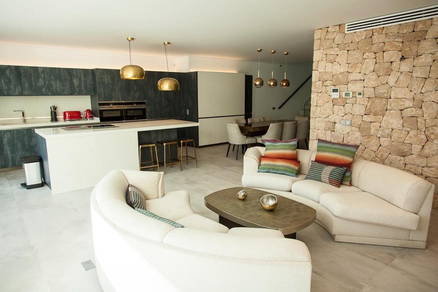 Resa estates Ibiza modern villa Cala llonga golf sale te koop livingroom.jpg